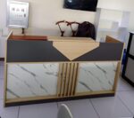 180cm modern office reception desk, 180cm reception desk, modern office reception desk, office reception desk, reception desk, reception counter, front office reception desk, office front desk, executive reception desk, luxury reception desk, premium reception desk, reception workstation, receptionist desk, office welcome desk, lobby reception desk, commercial reception desk, corporate reception desk, business reception desk, company reception desk, customer service desk, reception table, front desk counter, reception office furniture, office reception furniture, office furniture, modern office furniture, executive office furniture, commercial office furniture, workspace furniture, office interior furniture, stylish reception desk, elegant reception desk, contemporary reception desk, minimalist reception desk, wooden reception desk, reception desk with storage, reception desk with drawers, reception desk with shelves, reception desk with lockable cabinet, office lobby furniture, reception area furniture, reception station, office entrance desk, office check in desk, welcome counter, office reception counter, customer reception desk, professional reception desk, business furniture, corporate furniture, reception desk Kenya, office reception desk Kenya, reception counter Kenya, office furniture Kenya, reception desk Nairobi, office reception desk Nairobi, reception desk Kisii, office reception desk Kisii, reception desk Mombasa, office reception desk Mombasa, reception desk Nakuru, reception desk Eldoret, reception desk Thika, reception desk Kiambu, reception desk Kisumu, reception desk Kakamega, reception desk Meru, reception desk Machakos, reception desk Nyeri, reception desk Kericho, reception desk Bungoma, reception desk Kitale, reception desk Naivasha, reception desk Embu, reception desk Malindi, office furniture Nairobi, office furniture Kisii, office furniture Mombasa, reception furniture Kenya, reception desk supplier Kenya, office furniture supplier Kenya, reception desk dealer Kenya, reception desk shop Kenya, reception desk store Kenya, office furniture online Kenya, buy reception desk Kenya, reception desk for sale Kenya, reception desk price Kenya, affordable reception desk, premium reception desk Kenya, quality reception desk, durable reception desk, executive front desk, office welcome counter, hotel reception desk, clinic reception desk, hospital reception desk, salon reception desk, spa reception desk, school reception desk, bank reception desk, showroom reception desk, retail reception desk, office organization furniture, office décor furniture, reception area design, modern office setup, office furniture catalogue, reception desk catalogue, reception desk designs, furniture showroom Kenya, office furniture showroom Nairobi, reception desk online shopping Kenya, reception desk delivery Kenya, office furniture delivery Kenya, reception desk near me, office furniture near me, best reception desk, top reception counter, luxury office reception furniture, elegant reception counter, stylish office reception desk, high quality reception desk, strong reception counter, long lasting reception desk, low maintenance reception desk, imported reception desk, modern reception solutions, executive reception workstation, office reception cabinet, front office furniture, reception workspace, premium office reception, commercial reception furniture, reception counter with storage, reception desk with cable management, office reception table Kenya, business reception furniture Kenya, workspace reception solutions, office reception interior, reception furniture wholesale Kenya, office furniture wholesale Kenya, reception desk manufacturer Kenya, reception desk offers Kenya, office furniture deals Kenya, reception counter deals Kenya, professional front office desk, modern office entrance desk, premium reception furniture Kenya, executive reception counter, stylish reception area furniture, contemporary reception workstation, luxury business reception desk.
