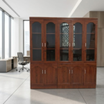 The 5-Door Mahogany Storage Cabinet provides a spacious and practical storage solution for offices, executive rooms, institutions, businesses, and professional workspaces. Its five-door design gives you ample room to organize files, documents, books, stationery, office equipment, and other essential items. Furthermore, its rich mahogany appearance adds a classic and professional touch to modern office interiors. Spacious Office Storage This 5-door mahogany storage cabinet provides multiple storage sections for keeping workplace items neatly arranged. You can organize files, folders, books, stationery, supplies, and equipment inside the cabinet while keeping your office free from unnecessary clutter. In addition, the enclosed doors keep stored items neatly out of sight and help create a cleaner working environment. You can place the cabinet alongside executive desks, office workstations, boardroom tables, filing cabinets, and office chairs. Moreover, its generous storage capacity makes it useful for offices that handle large amounts of paperwork and equipment. Elegant Mahogany Design The 5-Door Mahogany Storage Cabinet brings a warm and sophisticated appearance to professional spaces. Its mahogany finish can complement executive desks and other wooden office furniture, creating a coordinated interior. Furthermore, its classic design works well in both traditional and contemporary office settings. The cabinet also helps you make better use of available storage space. As a result, you can keep important office materials organized while maintaining a neat and professional appearance. Ideal for Offices and Institutions This 5-door office storage cabinet suits corporate offices, executive rooms, schools, institutions, business centres, reception areas, and administrative departments. Whether you need storage for files, books, stationery, or general office supplies, it provides a convenient solution for everyday organization. Key Features 5-door mahogany storage cabinet Spacious internal storage Five enclosed storage sections Elegant mahogany appearance Suitable for files and documents Ideal for books and stationery Useful for office supplies Helps reduce workplace clutter Professional executive design Suitable for corporate offices Ideal for institutions and businesses Complements mahogany office furniture Practical everyday storage solution The 5-Door Mahogany Storage Cabinet combines generous storage capacity, classic styling, and practical office organization. Whether used in an executive office, corporate workspace, institution, or business centre, it provides a convenient way to keep documents, books, supplies, and other essentials neatly arranged and easily accessible.